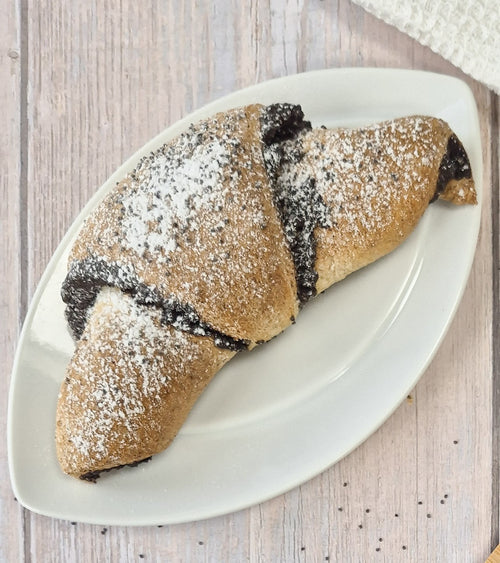 Low-carb poppy seed crescent roll made with ReWild CoreBake