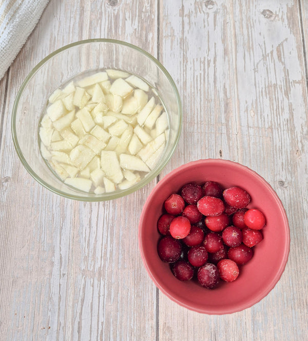 Step 2 – Chopped apple and cranberries prepared for apple cranberry cake made with ReWild CoreBake