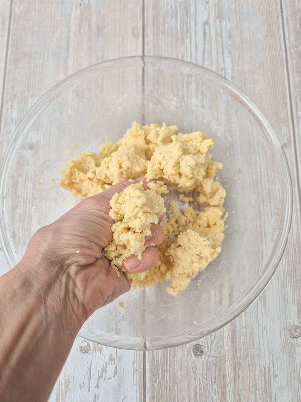 Step 4 – Pressing flatbread dough together by hand using ReWild CoreBake