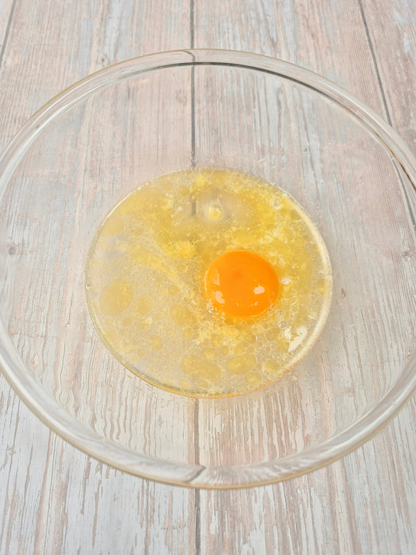 Step 1 – Wet ingredients for low-carb gluten-free flatbread in a mixing bowl using ReWild CoreBake