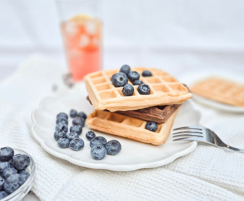 Gluten-free low-carb waffles with blueberries on a plate made with ReWild CoreBake flour blend
