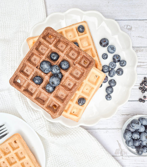 Healthy low-carb waffles topped with fresh blueberries made using ReWild CoreBake flour blend