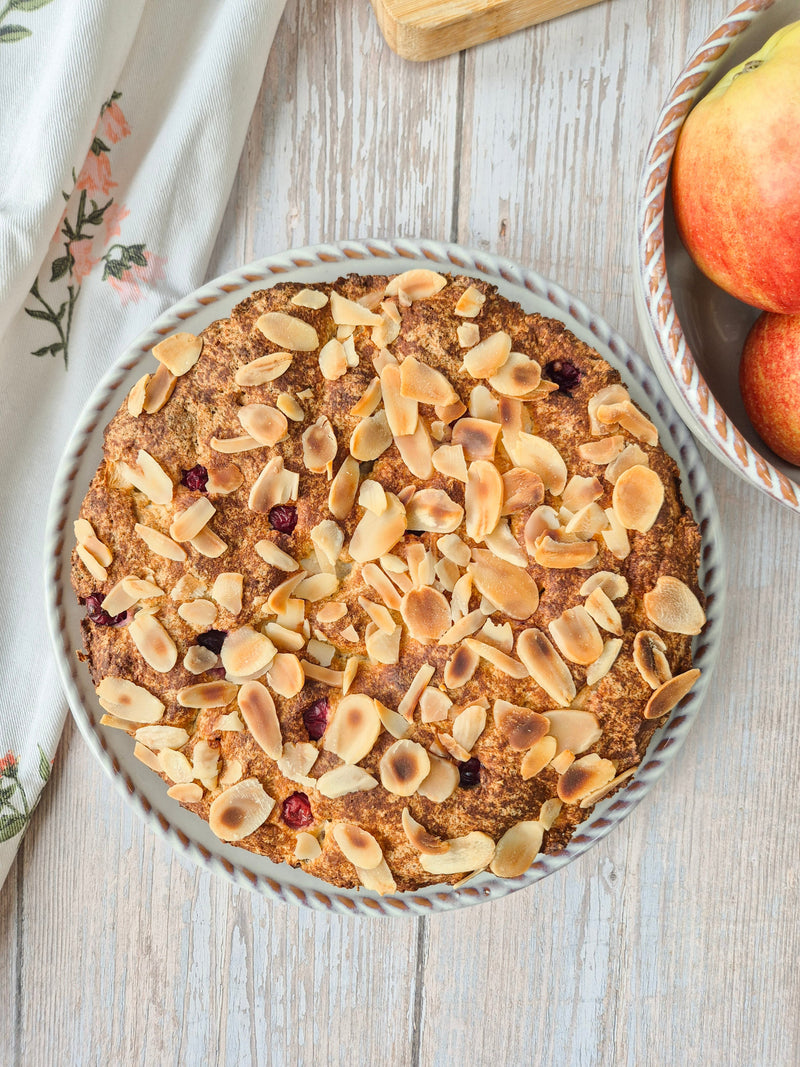 Low-carb gluten-free apple cranberry cake topped with toasted almonds made with ReWild CoreBake