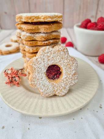 Low-carb gluten-free Linzer cookies filled with raspberry jam made using ReWild CoreBake
