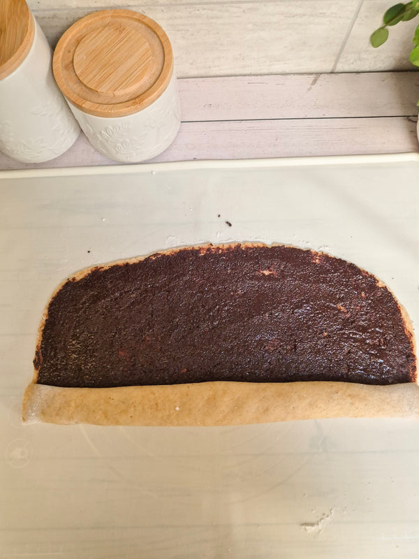 Step 9 – Spreading chocolate filling over gluten-free babka dough